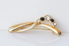 BLACK GOLD BROOCH